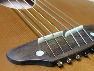 Let&#8217;s see if it is possible to put metal strings on a classical guitar