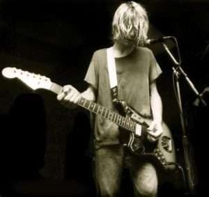 Kurt with a Fender Jaguar guitar