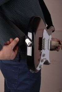 How to attach a strap to a guitar