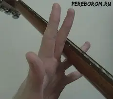 Finger stretch for guitar. 15 stretching exercises with photo examples