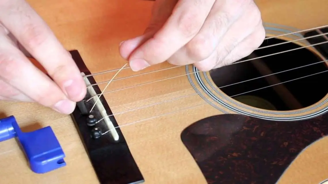 How to change guitar strings