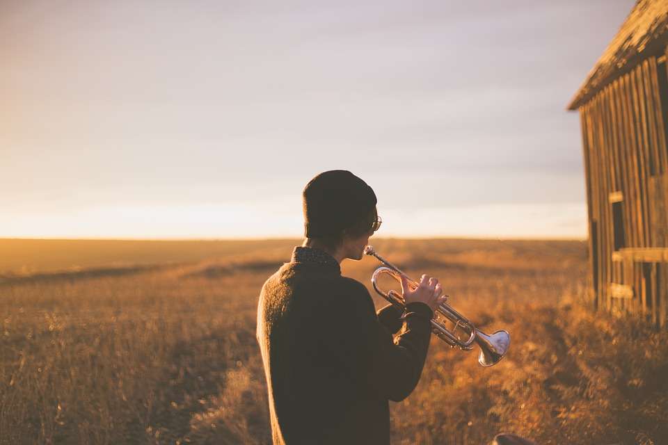 Plays the trumpet